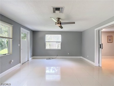 Nestled on just over an acre in North Fort Myers, this charming - photo 14