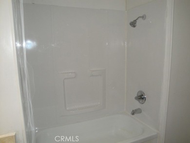 GREAT REMODELED WITH NEW PAINT, FLOORING, ROOF & APPLIANCES - photo 17