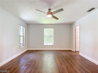 Nestled on just over an acre in North Fort Myers, this charming - photo 25