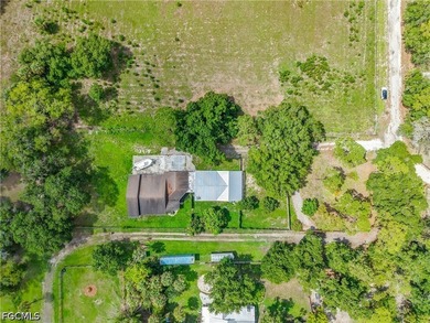 Nestled on just over an acre in North Fort Myers, this charming - photo 49