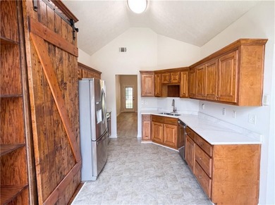 Situated on just over one acre, this well-maintained 3-bedroom - photo 6