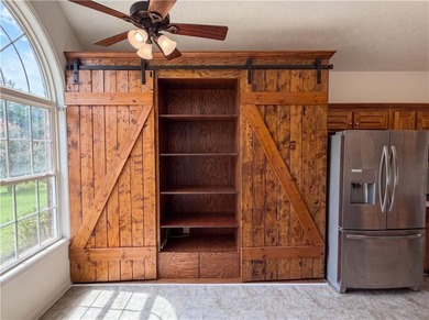 Situated on just over one acre, this well-maintained 3-bedroom - photo 9