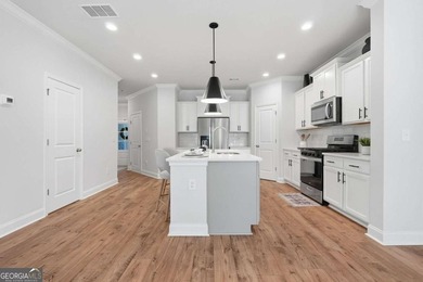 Prime Sugar Hill location! This virtually new townhome stands - photo 4
