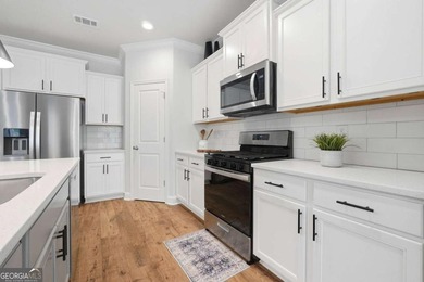 Prime Sugar Hill location! This virtually new townhome stands - photo 6