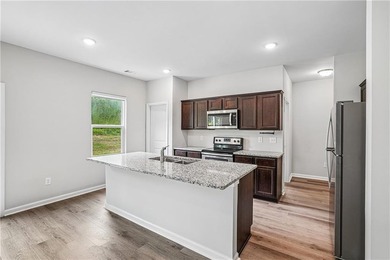 Welcome to this beautifully appointed 4-bedroom, 2.5-bath home - photo 7