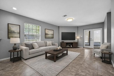 Welcome to this 2-bedroom, 2-bathroom first-floor corner unit in - photo 1