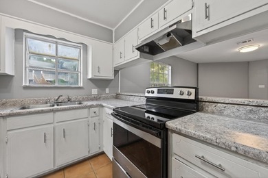 Welcome to this 2-bedroom, 2-bathroom first-floor corner unit in - photo 4
