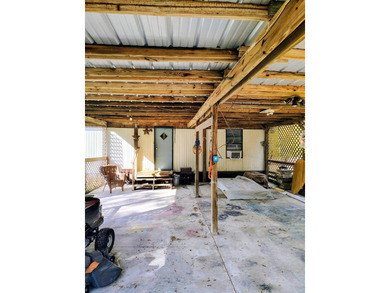 This charming 4-bedroom, 2-bath mobile home presents a fantastic - photo 8