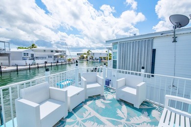 Spectacular peekaboo open water views abound with this updated 2 - photo 21