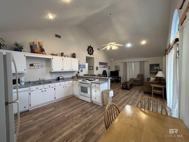Welcome to Gulf Shores living at its finest! Nestled on a - photo 2