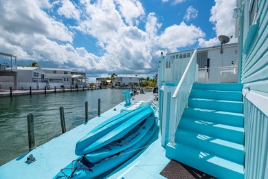 Spectacular peekaboo open water views abound with this updated 2 - photo 26