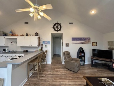 Welcome to Gulf Shores living at its finest! Nestled on a - photo 9