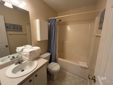 Welcome to Gulf Shores living at its finest! Nestled on a - photo 10