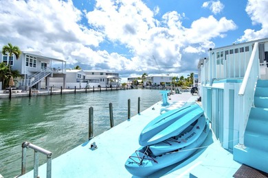 Spectacular peekaboo open water views abound with this updated 2 - photo 32