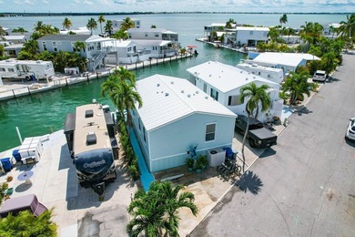 Spectacular peekaboo open water views abound with this updated 2 - photo 36