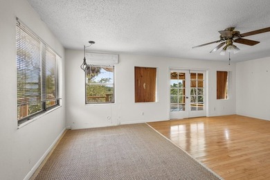 Tucked away on a private waterfront peninsula in historic Cedar - photo 7