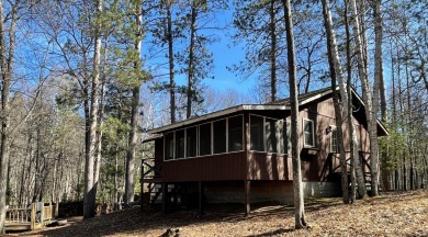 Stop searching, you have found it. This great little 2 BD/1BA - Lake Home For Sale in Arbor  Vitae, Wisconsin