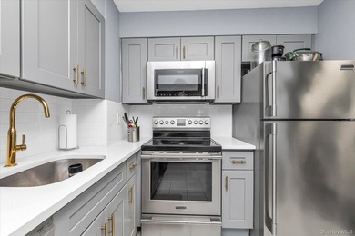 Welcome to Elevated Coastal Living in this Beautiful Updated 1 - photo 3