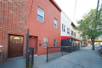 Rare-find oversized 2-family brick home with 8 bedrooms, 5 full - photo 3
