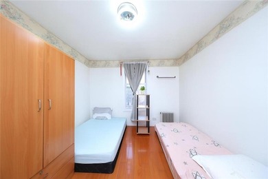 Rare-find oversized 2-family brick home with 8 bedrooms, 5 full - photo 8