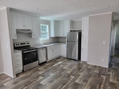 Welcome to this inviting Manufactuerd home located at 127 Hubert - photo 1