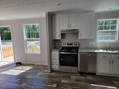 Welcome to this inviting Manufactuerd home located at 127 Hubert - photo 2
