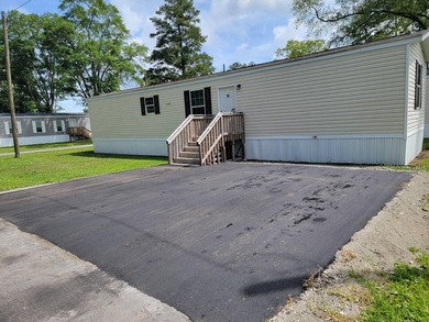 Welcome to this inviting Manufactuerd home located at 127 Hubert - photo 3