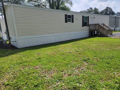Welcome to this inviting Manufactuerd home located at 127 Hubert - photo 4