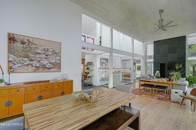 A striking modern retreat where architecture and landscape exist - photo 13