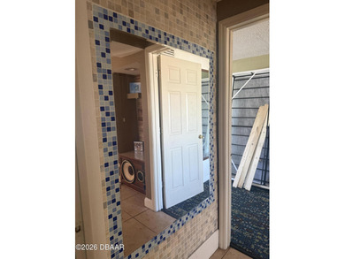 Once sitting in the shadows of a water tower, 336 E