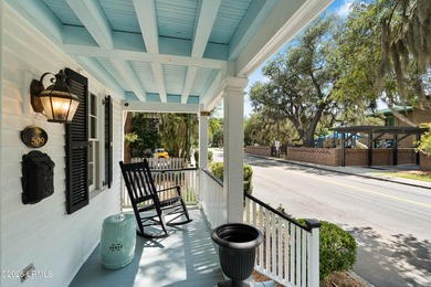 Anchored by a magnificent 400 year old live oak at the front of - photo 3