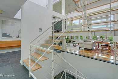 A striking modern retreat where architecture and landscape exist - photo 26