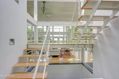A striking modern retreat where architecture and landscape exist - photo 27