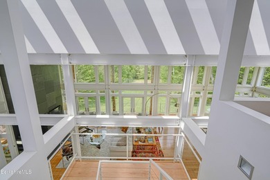 A striking modern retreat where architecture and landscape exist - photo 28