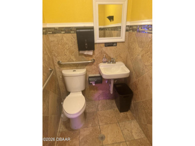 Once sitting in the shadows of a water tower, 336 E