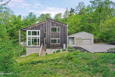 A striking modern retreat where architecture and landscape exist - photo 50