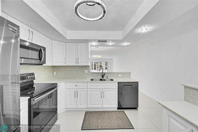 Lake Condo For Sale in Coconut Creek, Florida