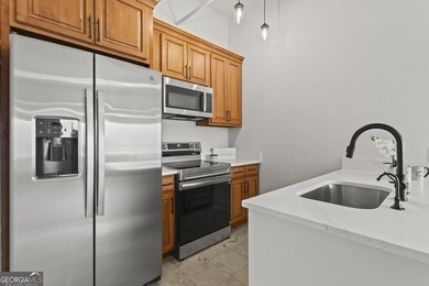 Experience elevated city living in this beautifully updated