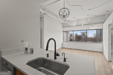 Experience elevated city living in this beautifully updated