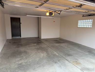 You are home as the easy-care front yard combines a small lawn