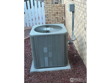 You are home as the easy-care front yard combines a small lawn