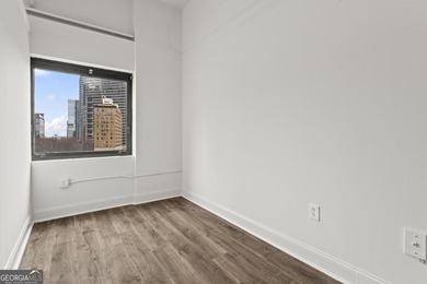 Experience elevated city living in this beautifully updated