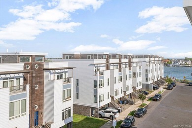 Discover beach side living in this luxury 2 family townhouse - photo 1