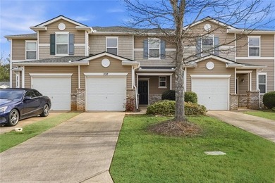 Built in 2005, this 1,551 sq. ft. 2-story townhome features 3 - photo 2