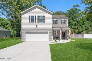 Welcome home to this beautiful 4-bedroom, 2.5-bath home - photo 2