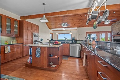 Discover a rare multi-generational property with sweeping views - photo 10
