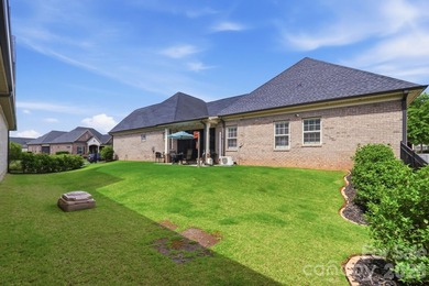 Welcome to this stunning all-brick, single-story home that truly - photo 37