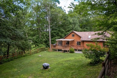 Set on 2.67 acres near Downsville, this inviting Catskills cabin - photo 4