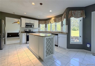 Located in a desirable neighborhood, this spacious home offers a - photo 5