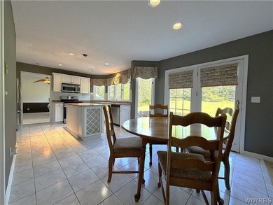 Located in a desirable neighborhood, this spacious home offers a - photo 6